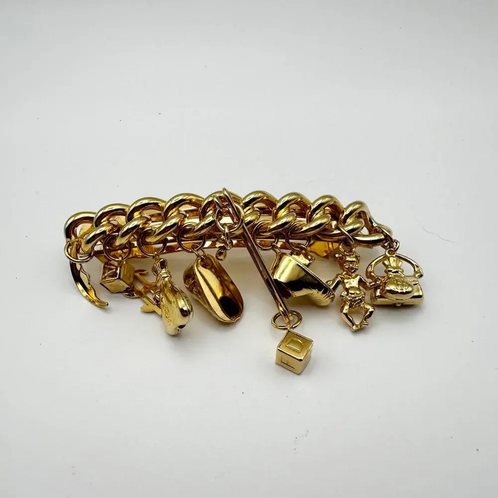 Kirks Folly France USA Gold Tone Fully Loaded Charm Barrette Million Dollar Baby
